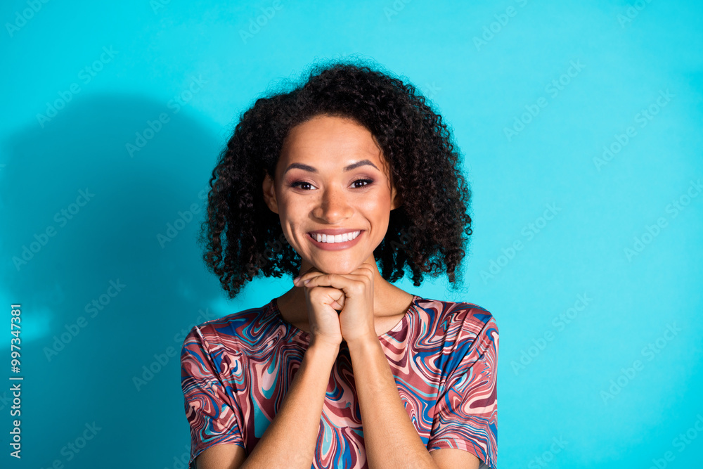 Photo portrait of pretty young girl dreamy hands together wear trendy colorful clothes isolated on aquamarine color background