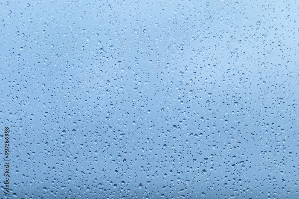 Rainfall creates a soothing atmosphere on a clear blue sky background, enhancing the calmness of the surroundings during a quiet afternoon Rainfall creates a soothing atmosphere on a clear blue sky background, enhancing the calmness of the surroundings during a quiet afternoon