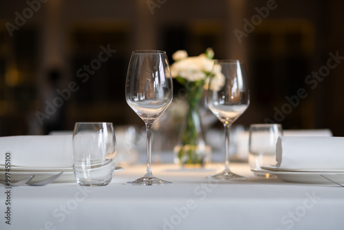 Wallpaper Mural empty glass of water on the table with blur background Torontodigital.ca