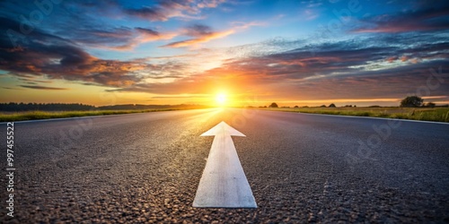 Fotografía en ángulo bajo de una flecha blanca en una carretera de asfalto durante el atardecer, concepto de camino recto, dirección hacia el éxito y guía para el futuro. photo