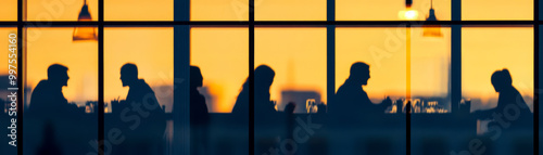 cozy cafe at dusk with silhouetted figures enjoying their time together, creating warm and inviting atmosphere. sunset casts beautiful glow through windows