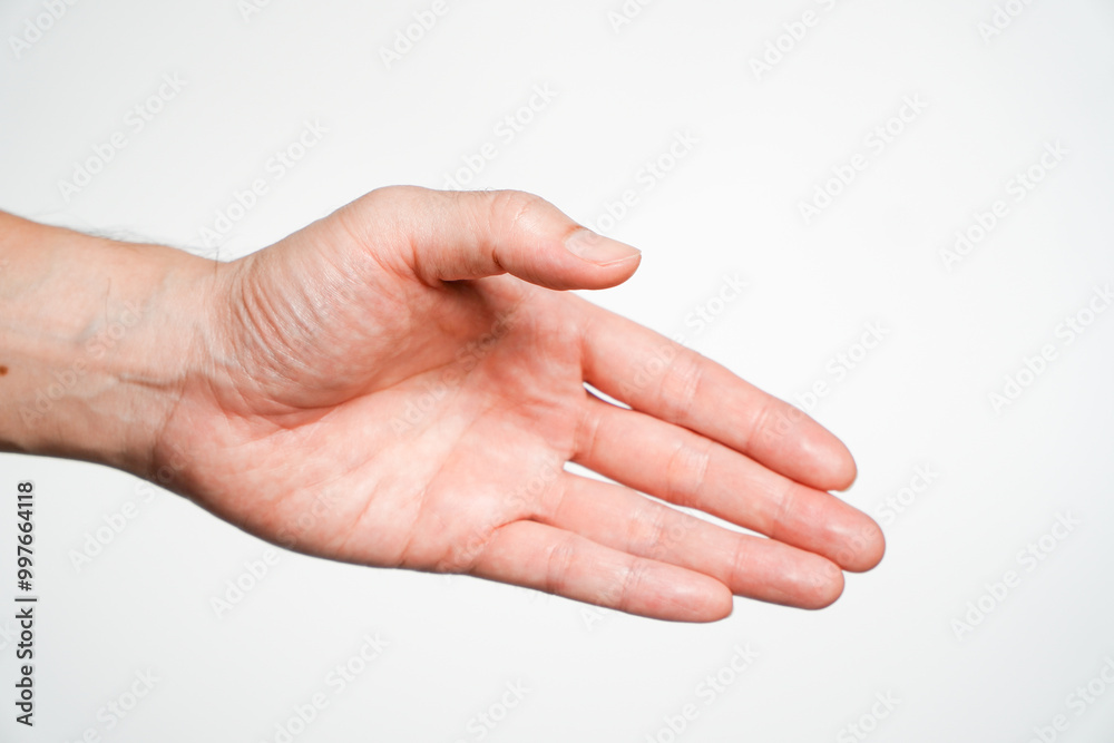 Businessman's hand congratulated on success,Men welcome and shake hands on white background, closeup Businessman's hand congratulated on success,Men welcome and shake hands on white background, closeup