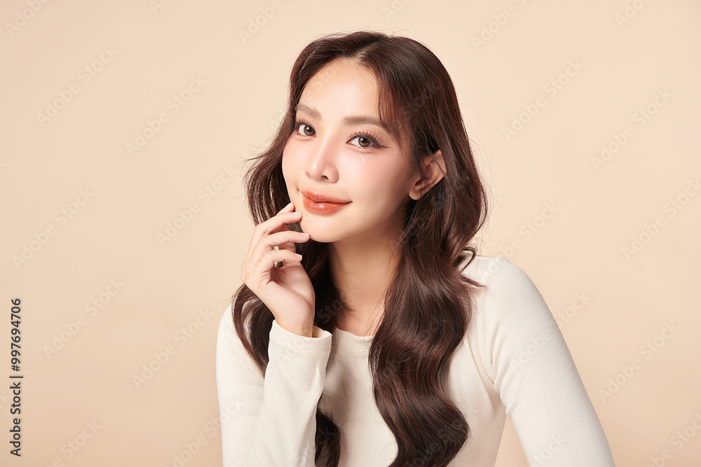 Beautiful young asian woman with clean fresh skin on beige background, Face care, Facial treatment, Cosmetology, beauty and spa, Asian women portrait. Beautiful young asian woman with clean fresh skin on beige background, Face care, Facial treatment, Cosmetology, beauty and spa, Asian women portrait.