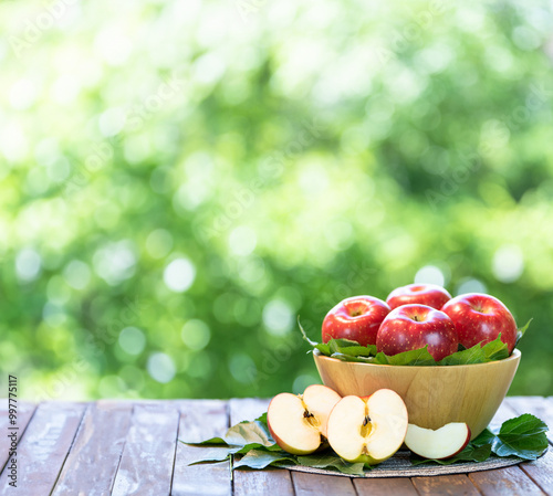 Wide Angle Red Japanese Apple in Wooden tray, Shinano Red and Sansa  Apple on wooden background.  photo