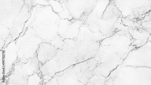 White Marble Texture Wallpaper. A luxurious white marble texture with subtle gray veining.