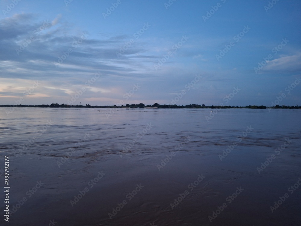 sunset over the river , kong river sunset over the river , kong river