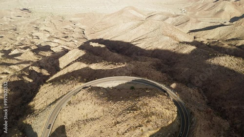 Desert hills and roads during sunset in Palm Desert, California