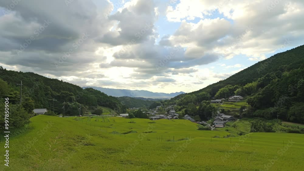 Terraced rice field landscape at sunset, Asian rural village in autumn, before harvest Terraced rice field landscape at sunset, Asian rural village in autumn, before harvest