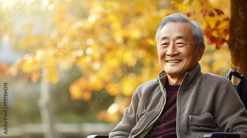 An elderly Asian man with fair, healthy skin gives a slight smile, Blurred background.