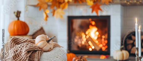 A cozy living room with a fireplace and a pumpkin on a pillow photo