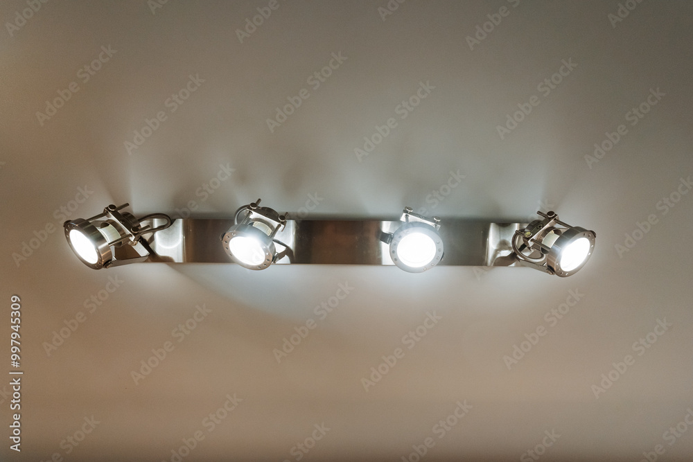 A beautiful row of colorful lights is elegantly hanging on the wall, adding a unique touch of atmosphere and vibrancy to the overall surroundings and enhancing the visual appeal A beautiful row of colorful lights is elegantly hanging on the wall, adding a unique touch of atmosphere and vibrancy to the overall surroundings and enhancing the visual appeal