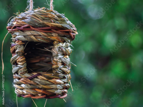 Handwoven Birdhouse Hanging Outdoors