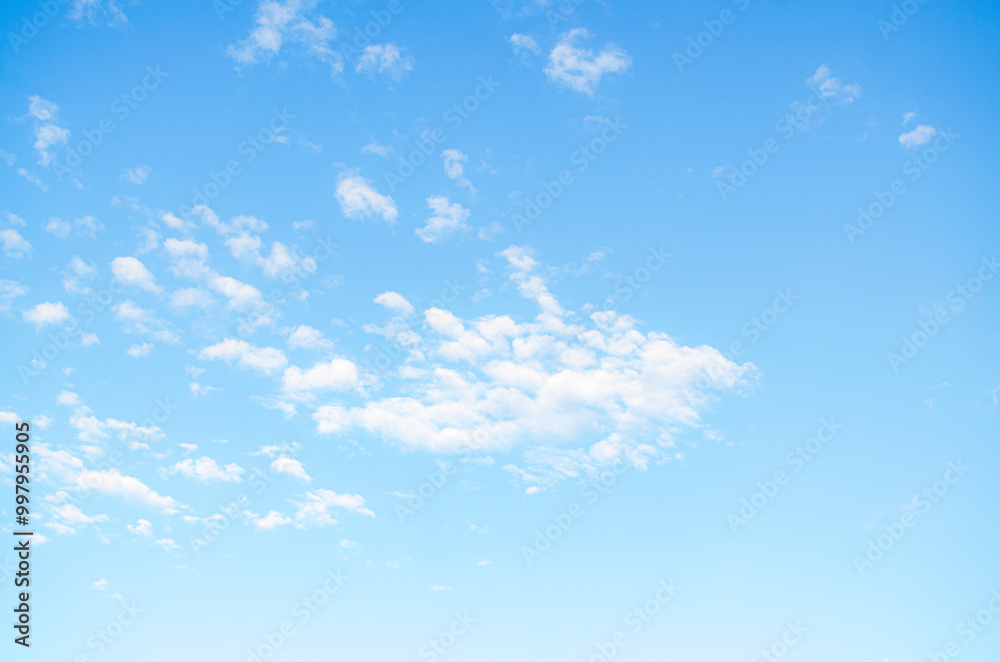 Beautiful view of blue sky with clouds at sunset. Partly cloudy. Beautiful view of blue sky with clouds at sunset. Partly cloudy.