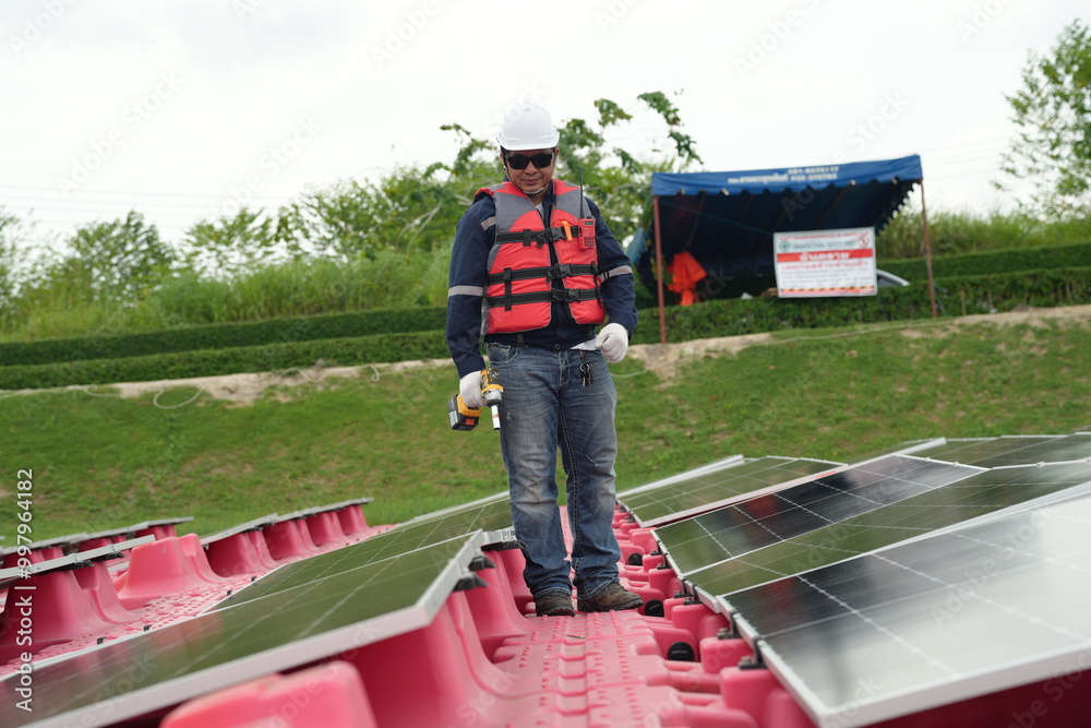 Floating solar panels providing renewable energy. Aerial view floating on solar cells Floating solar panels providing renewable energy. Aerial view floating on solar cells