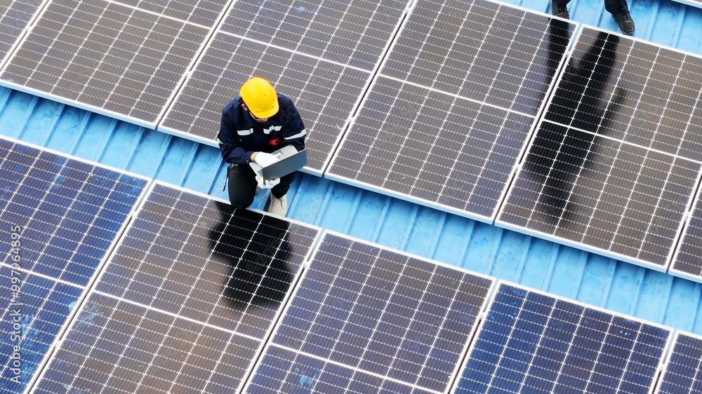 Floating solar panels providing renewable energy. Aerial view floating on solar cells