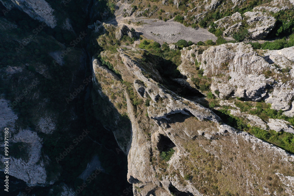Obraz premium Aerial view of a deep limestone gorge, canyon