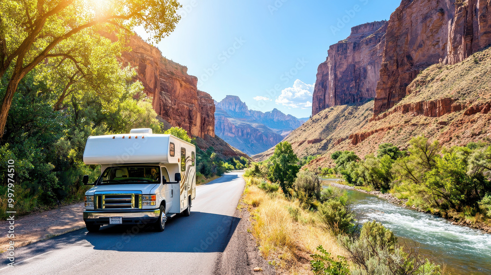 Scenic view of an RV traveling along a winding road through a stunning canyon landscape with rocky cliffs and flowing river Scenic view of an RV traveling along a winding road through a stunning canyon landscape with rocky cliffs and flowing river