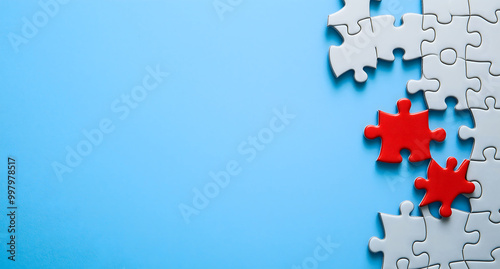 jigsaw puzzle with one piece missing on a blue background, symbolizing the feeling that something is not complete or entire