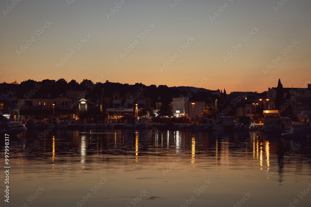 Fototapeta premium sunset over the harbor