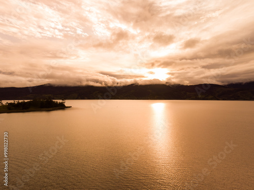Amazing aerial view of la cocha lake on sunset in nariño colombia 