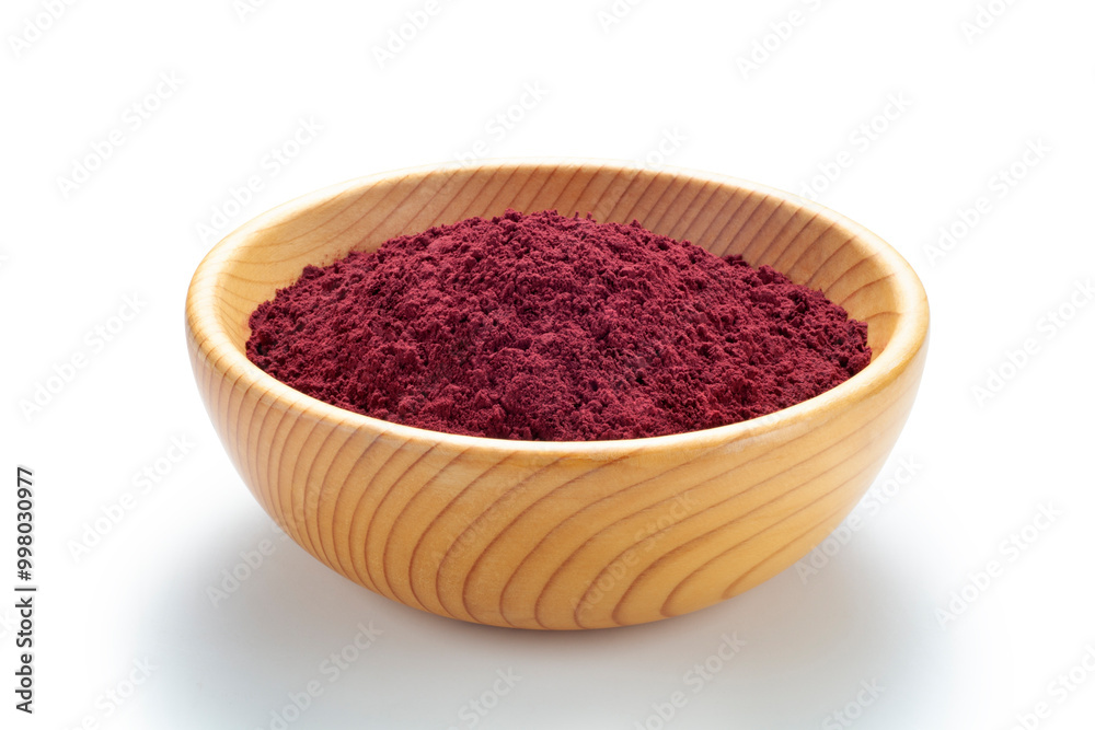 Red yeast rice powder in wooden bowl, Chinese traditional food and medicine Red yeast rice powder in wooden bowl, Chinese traditional food and medicine