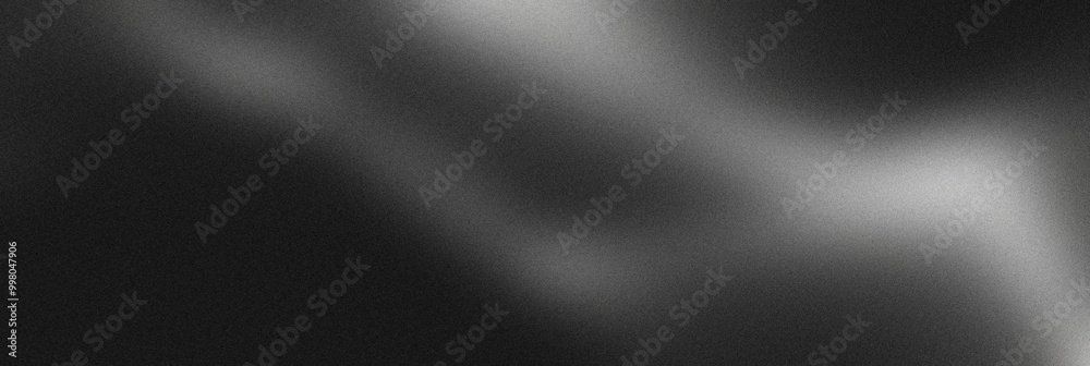 Black and White Gradient Background with Subtle Light and Noise Grain Effect Black and White Gradient Background with Subtle Light and Noise Grain Effect
