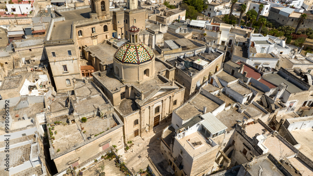 Fototapeta premium Aerial view of the San Francesco da Geronimo sanctuary located in the historic center of Grottaglie. It is a church of the city in the province of Taranto, in Puglia, Italy.