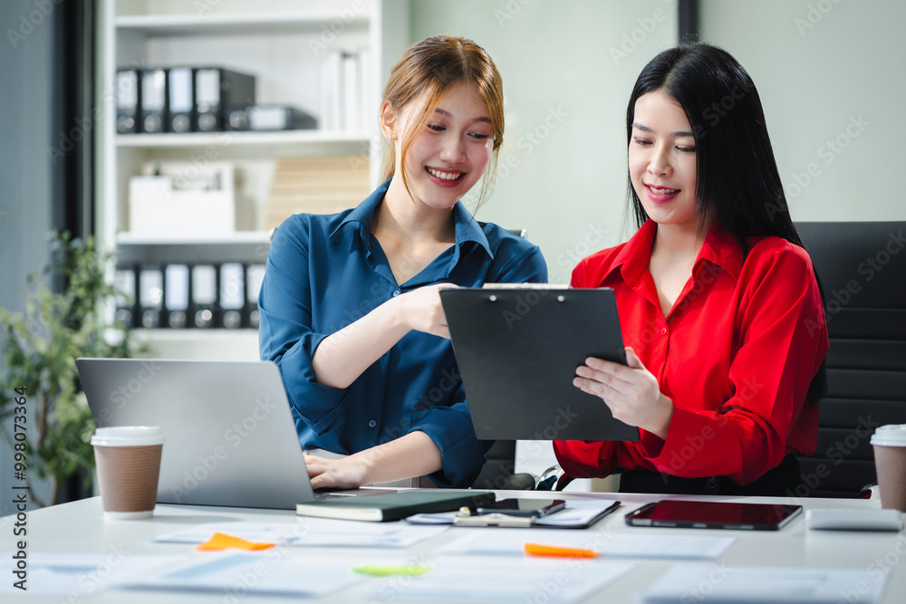 Professional investor working new start up project. Finance managers meeting.using laptop and digital tablet computer in office. Professional investor working new start up project. Finance managers meeting.using laptop and digital tablet computer in office.