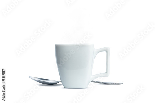 Coffee cup with subtle smoke and silver spoon