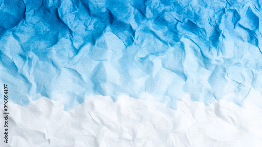 Fototapeta premium Soft white foundation mixed with hints of light blue creating a gradient reminiscent of snowy landscapes 