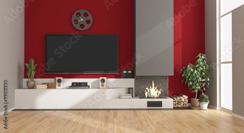 Modern living room with fireplace and tv showing red wall