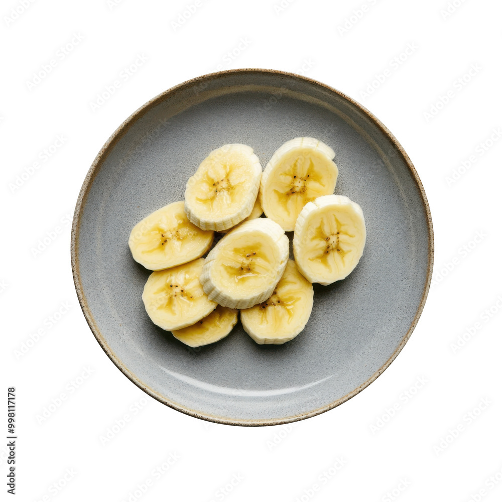 fresh banana slices on a gray plate with isolated transparent background, cut out fresh banana slices on a gray plate with isolated transparent background, cut out