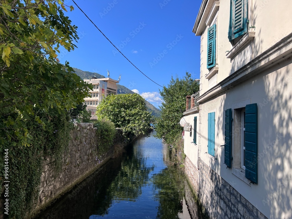 River between two houses in Kotor, Montenegro in 2024 sunny day River between two houses in Kotor, Montenegro in 2024 sunny day