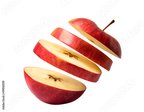 Cross slices of red apple floating in the air. Transparent background.