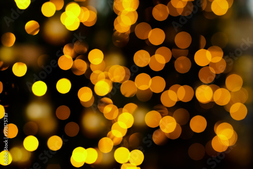 blurred christmas interior with golden lights bokeh