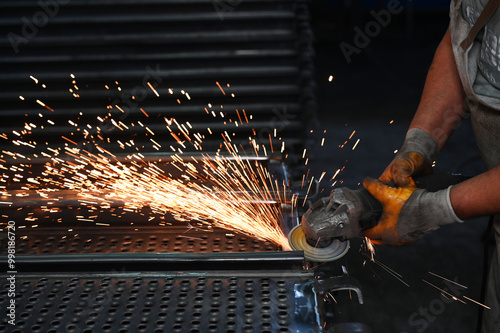 Canvas Print Grinding and smoothing metal surfaces with grinding