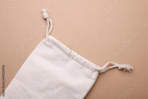 Linen bag on a beige background. Eco concept