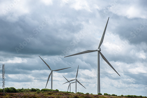 Landscape photography of wind turbine; windmill; wind power; power generation; electricity; industry; innovation; green energy; Whitelee Windfarm, Scotland photo