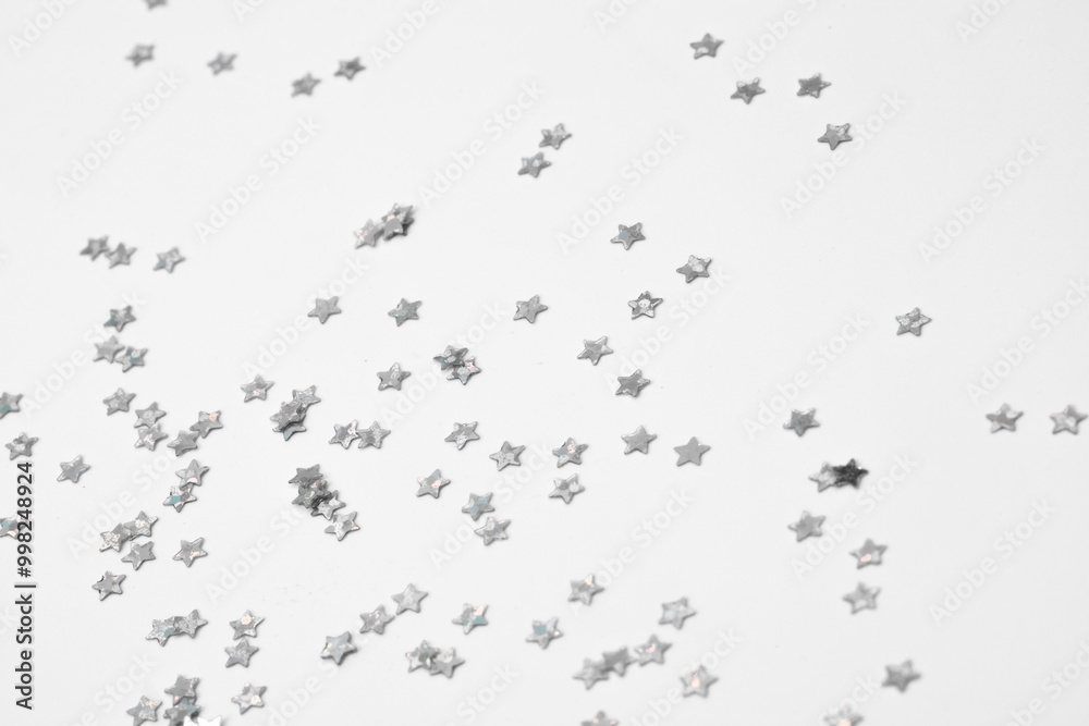 sparkles silver stars on white background with text place- Image sparkles silver stars on white background with text place- Image