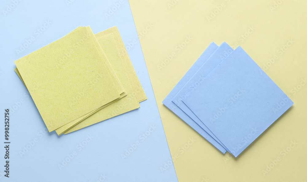 Blue and pink memo square papers on pastel background. Template for design Blue and pink memo square papers on pastel background. Template for design