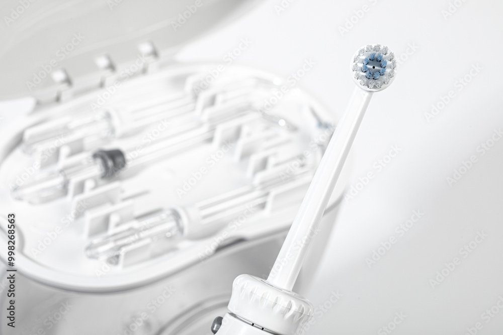 irrigator for oral care on a light background- Image irrigator for oral care on a light background- Image