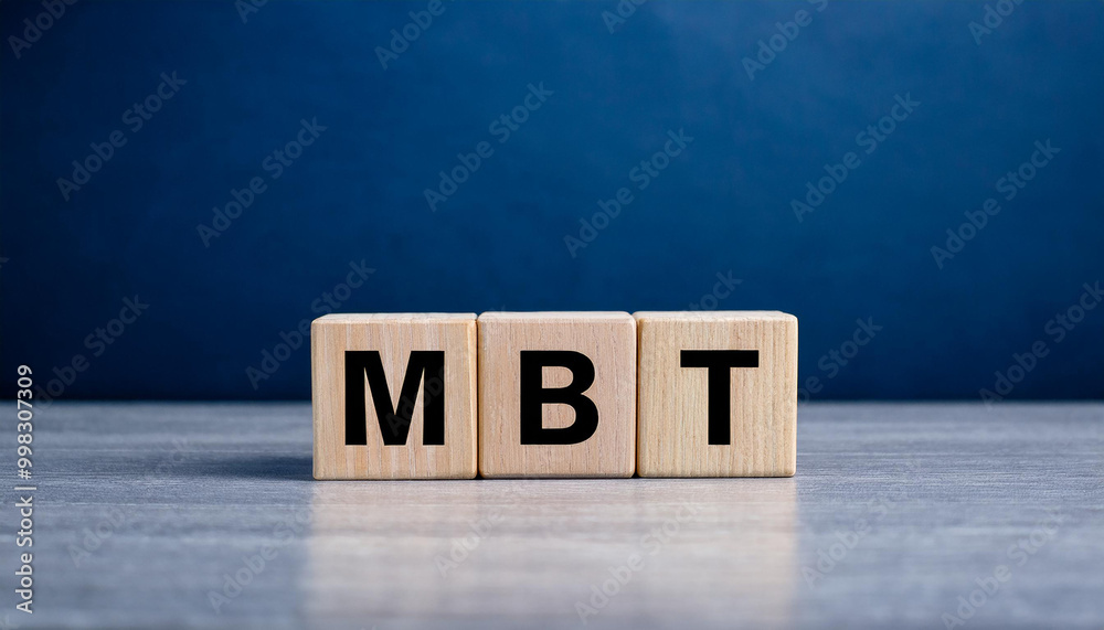 Wooden cubes with abbreviation MBT. Mindfulness-Based Therapy. Military Battle Tank. Wooden cubes with abbreviation MBT. Mindfulness-Based Therapy. Military Battle Tank.