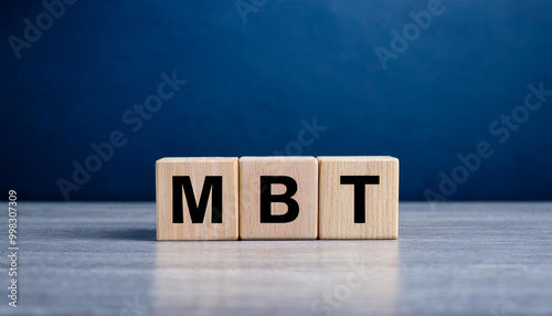 Wooden cubes with abbreviation MBT. Mindfulness-Based Therapy. Military Battle Tank. photo