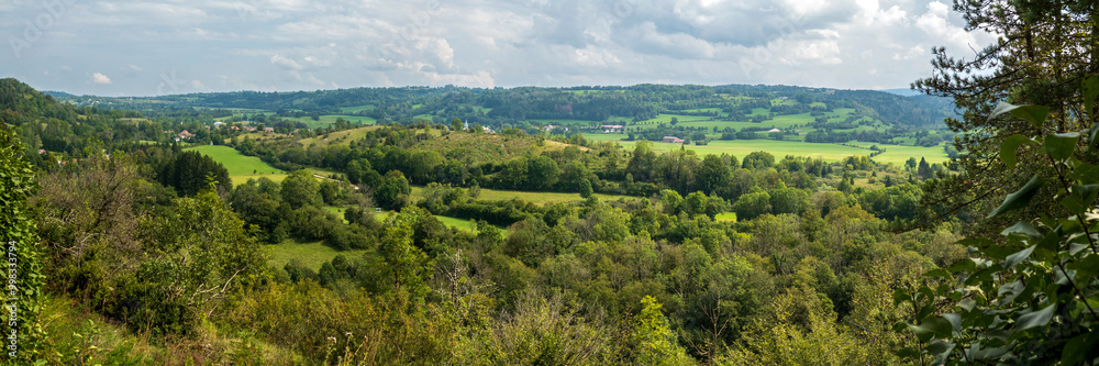 Panoramic view over the Ain valley near Sirod in the French Jura in summer Panoramic view over the Ain valley near Sirod in the French Jura in summer