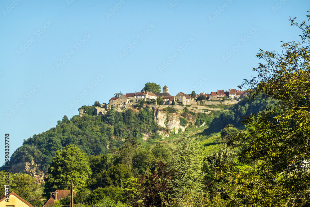 The village of Chateau Chalon and its vineyards, in the French Jura, known for its local wines made of savagnin grapes The village of Chateau Chalon and its vineyards, in the French Jura, known for its local wines made of savagnin grapes