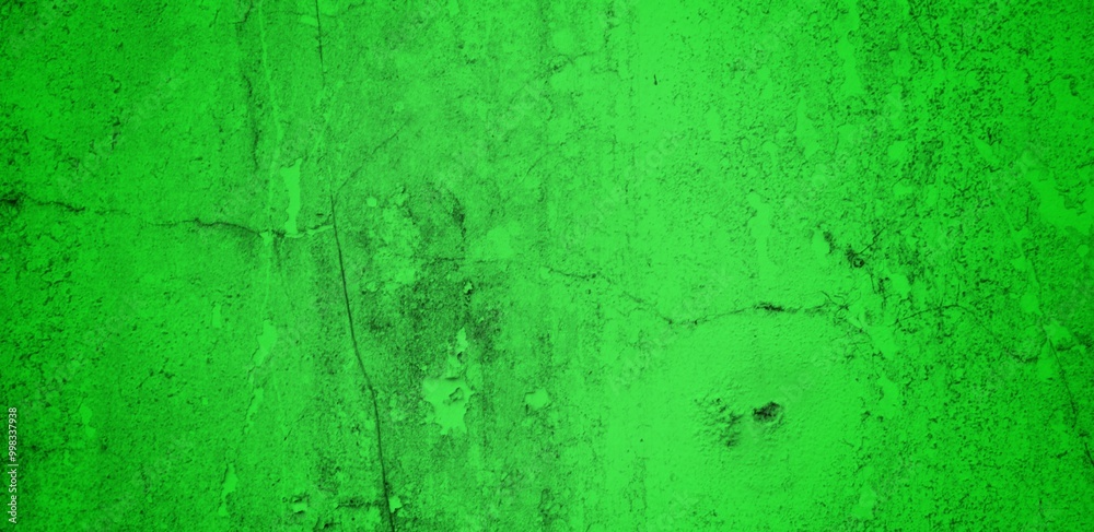 Obraz premium the long wall background is green, blank uncoated canvas or scrim for background long and wide panoramic banner background from rough linen dark green cloth or burlap
