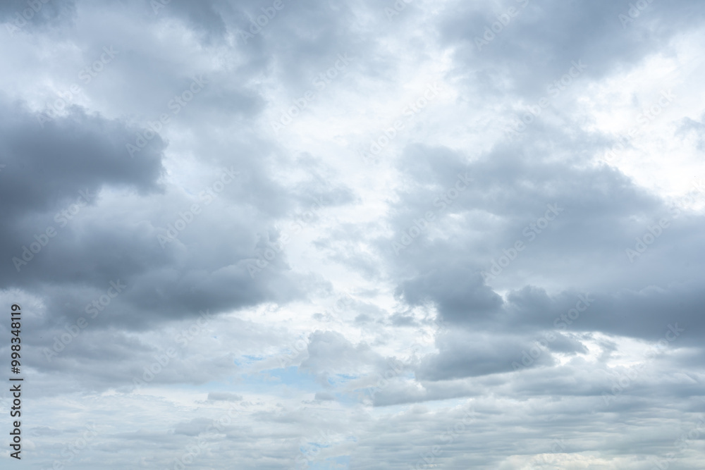 Fluffy White Clouds in a Bright Blue Sky Fluffy White Clouds in a Bright Blue Sky
