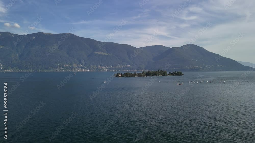 Forward shot of Lake Maggiore in Italy located on the southern side of the Alps on the island of Brissago. Forward shot of Lake Maggiore in Italy located on the southern side of the Alps on the island of Brissago.