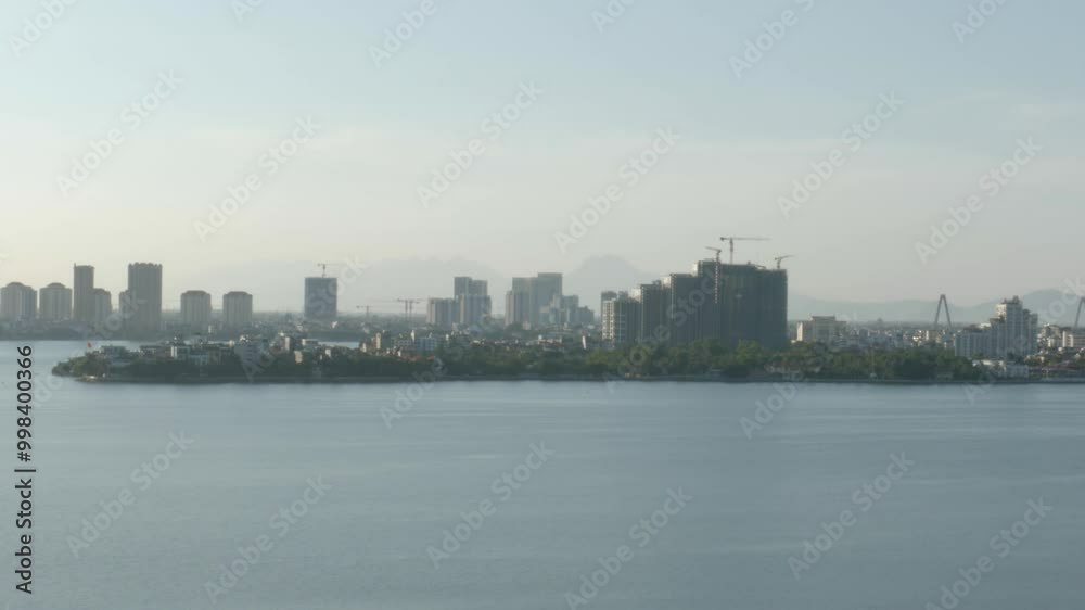 Landscape View Of Hanoi Skyline From Tay Ho Lake In Tay Ho District, Vietnam. static shot Landscape View Of Hanoi Skyline From Tay Ho Lake In Tay Ho District, Vietnam. static shot