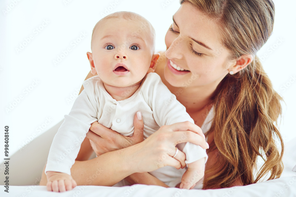 Happiness, hug and baby with mother in bedroom for security, care and safety. Growth, support and love with woman and kid bonding in family home for trust, youth and child development together Happiness, hug and baby with mother in bedroom for security, care and safety. Growth, support and love with woman and kid bonding in family home for trust, youth and child development together
